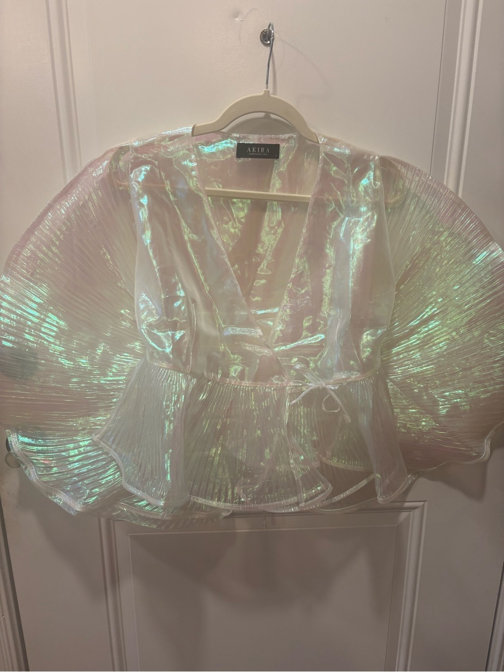 AKIRA Iridescent Sheer Wrap Peplum Top with Green Shimmer